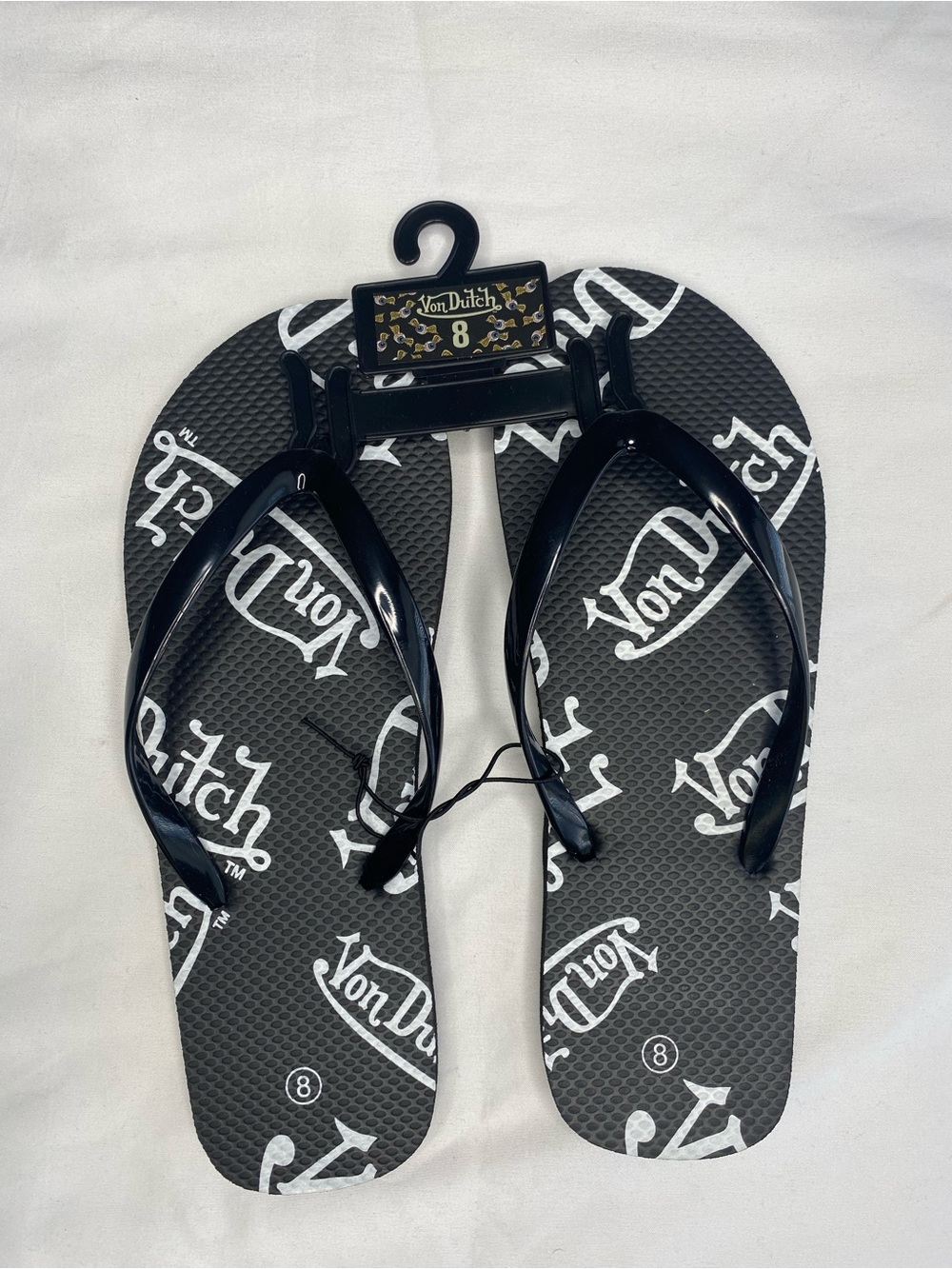 Von Dutch Black and White Logo Flip Sandals